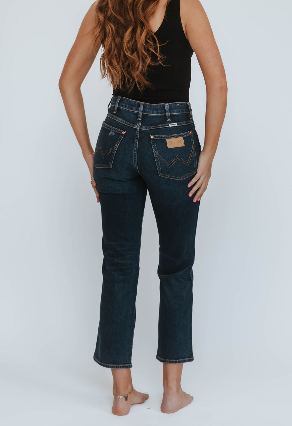 Wrangler Wild West Wonder Women denim bottoms featuring classic Western style and detailed stitching, shown on a model.