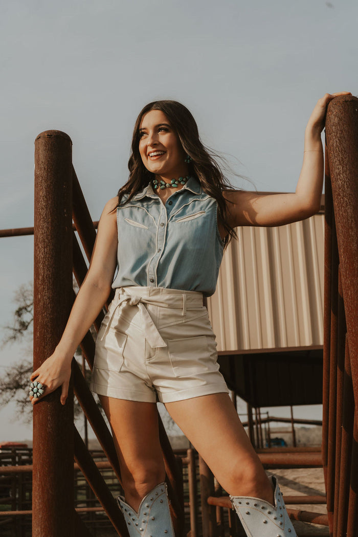 White creamy shorts from Western Vogue Boutique, stylish bottoms with a comfortable fit and modern design.