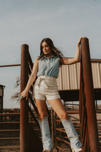 White creamy shorts from Western Vogue Boutique, featuring a stylish fit and comfortable fabric, perfect for casual wear.