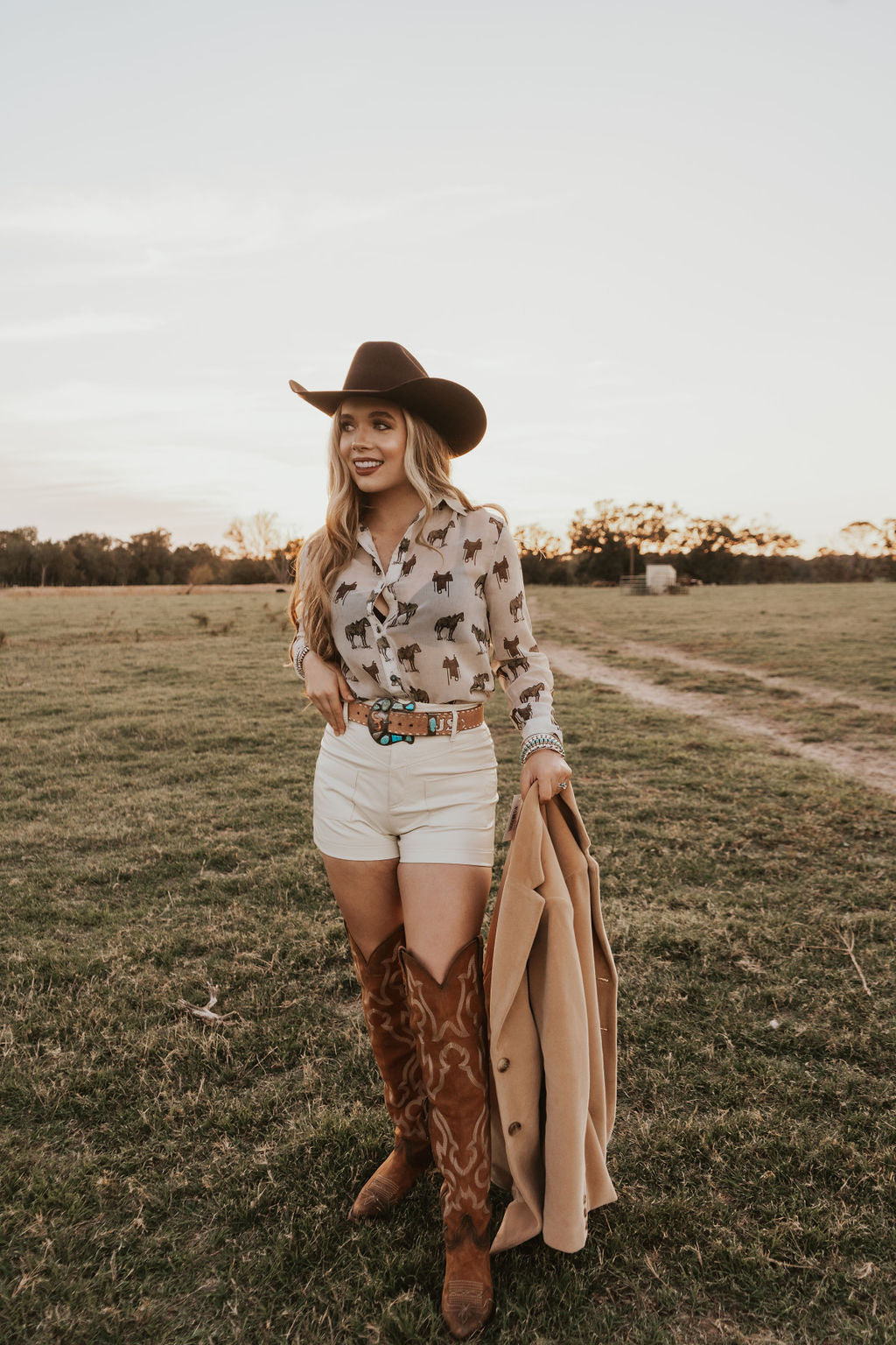 White creamy shorts from Western Vogue Boutique featuring a relaxed fit and stylish design, perfect for casual summer wear.