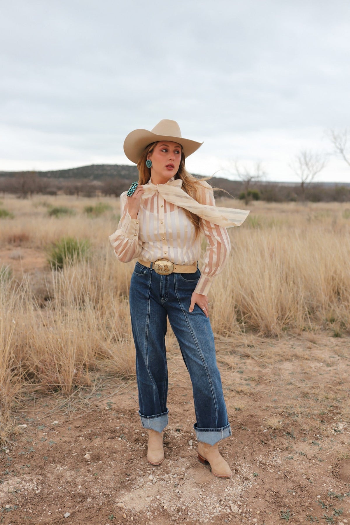 Women’s denim jeans from Western Vogue Boutique, Macon style, showcasing classic blue bottoms with a relaxed fit.