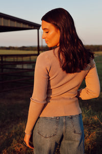 Khaki Chelsea Cardigan by Western Vogue Boutique, stylish outerwear with a cozy fit and button details, displayed on a hanger.