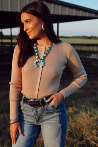 Western Vogue Boutique Chelsea Cardigan in khaki, a cozy outerwear piece with a classic fit and button closure.