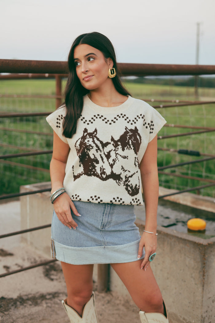 Western Vogue Boutique Thoroughbred Sweater Vest, outerwear with a classic knit design, displayed on a hanger.