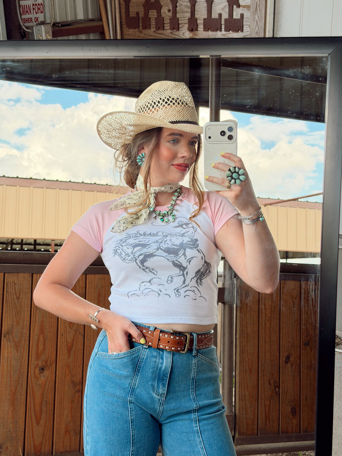 Women's The Cowboy Doodle T-Shirt by Western Vogue Boutique, featuring a stylish cowboy doodle design on a casual top.