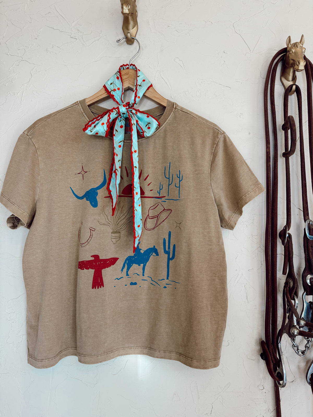 Western Vogue Boutique Cowboy Things T-Shirt, casual top with western-inspired design, showcasing a comfortable fit and stylish detail.