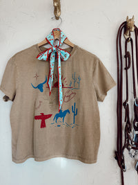 Western Vogue Boutique Cowboy Things T-Shirt, casual top with western-inspired design, showcasing a comfortable fit and stylish detail.