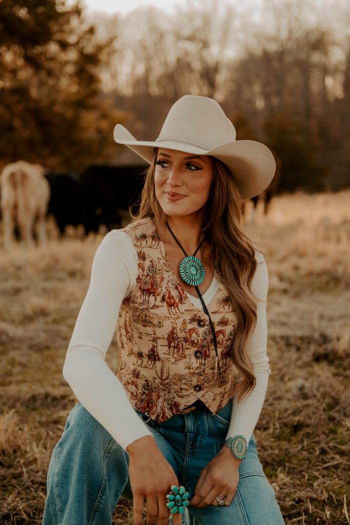 Deadwood Women's vest from Western Vogue Boutique, stylish western-inspired top with leather accents and fringe details.