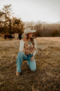 Western Vogue Boutique Deadwood Women's vest, stylish western tops with leather accents, shown on a model.