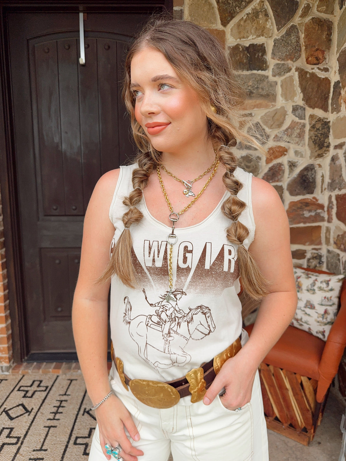 Western Vogue Boutique cowgirl tank top featuring a Western horses design, sleeveless style, casual Western-inspired fashion top.