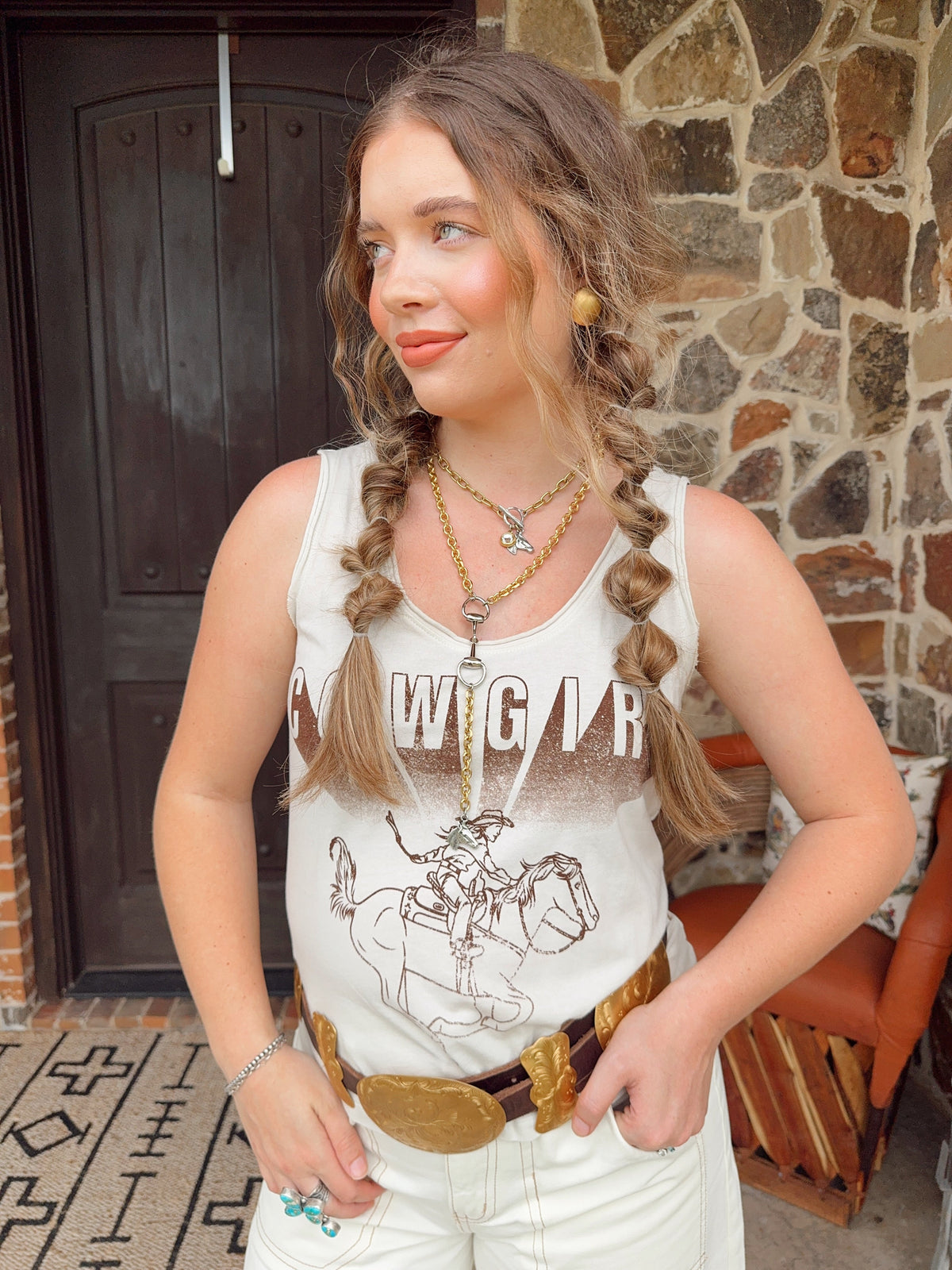 Western Vogue Boutique cowgirl tank top with western-inspired design, sleeveless tops for women featuring a casual, stylish look.