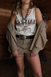 Cowgirl tank top from Western Vogue Boutique featuring Western-inspired design and casual sleeveless style.