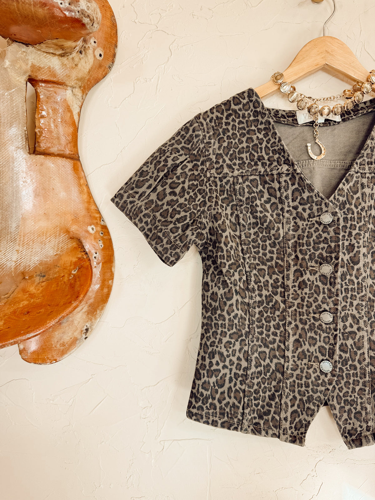 Leopard print denim top from Western Vogue Boutique featuring long sleeves and a casual, stylish fit.