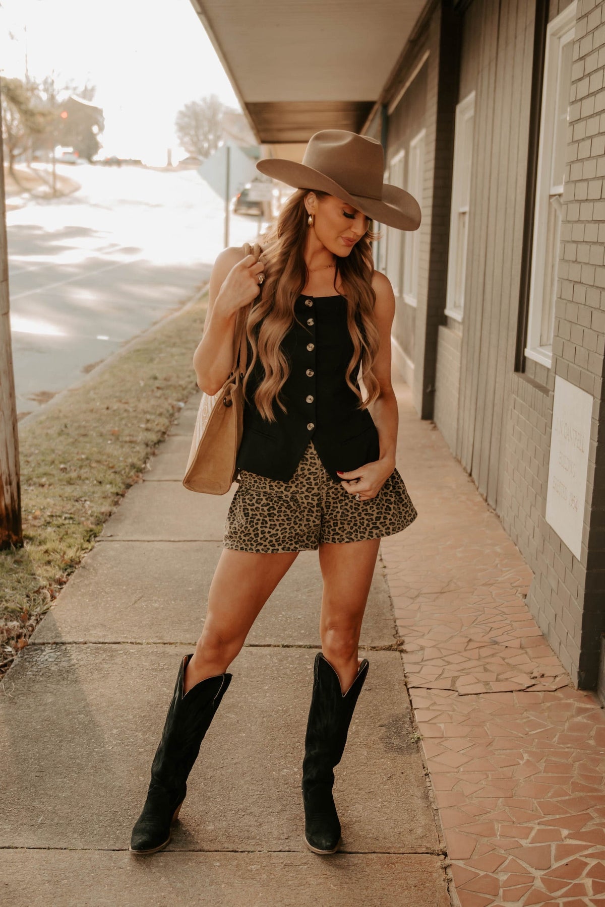 Close-up of The Tia Tip Top tops by Western Vogue Boutique, showing fabric texture and stylish design details.