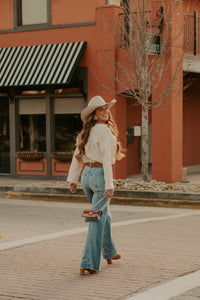 Ecru Tulsa Top from Western Vogue Boutique, soft lightweight blouse with relaxed fit and subtle texture.