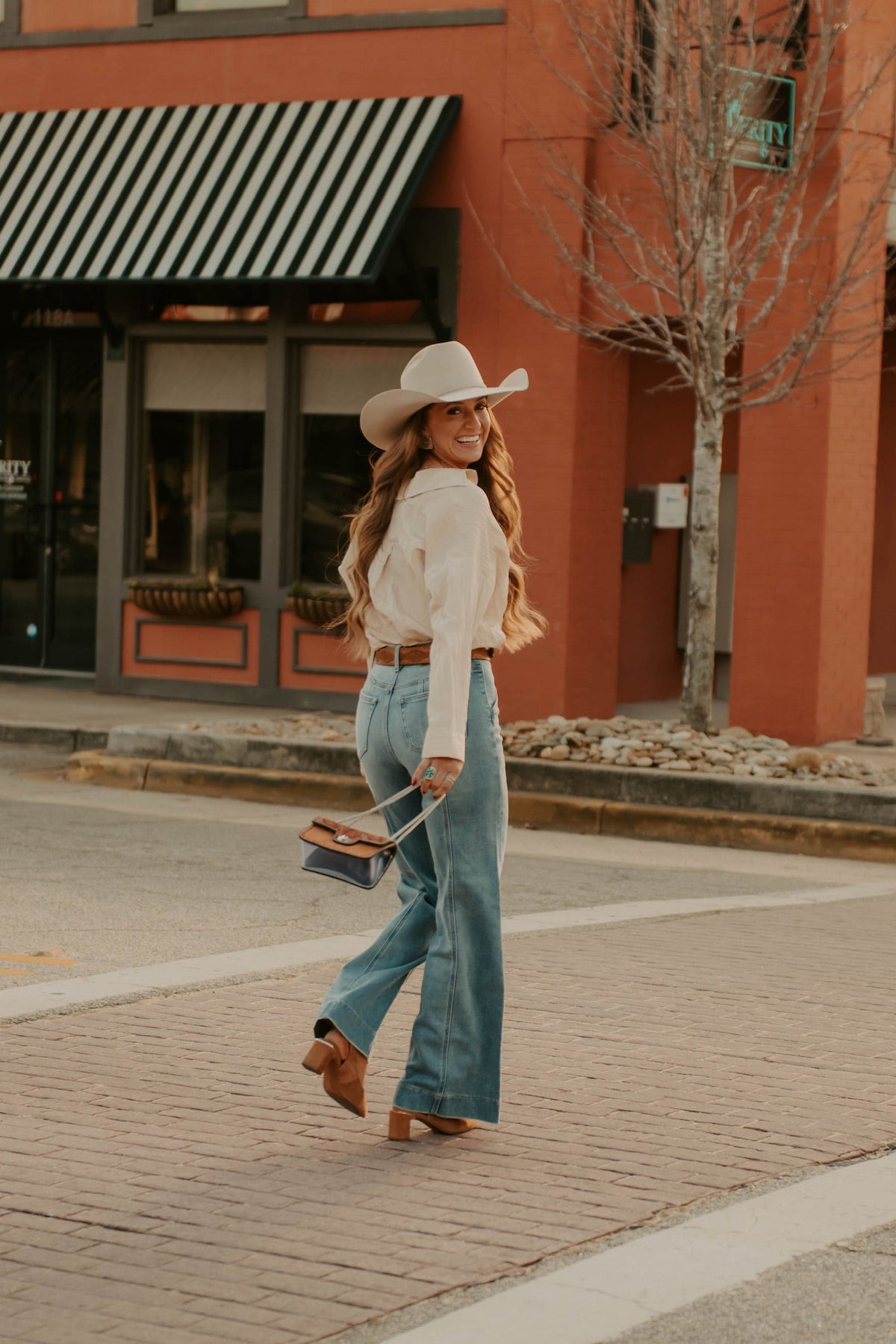 Ecru Tulsa Top by Western Vogue Boutique, featuring a stylish casual top with a relaxed fit and soft fabric.
