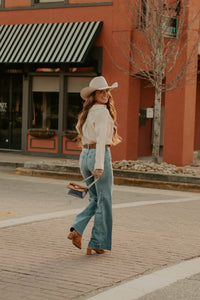 Ecru Tulsa Top by Western Vogue Boutique, featuring a stylish casual top with a relaxed fit and soft fabric.