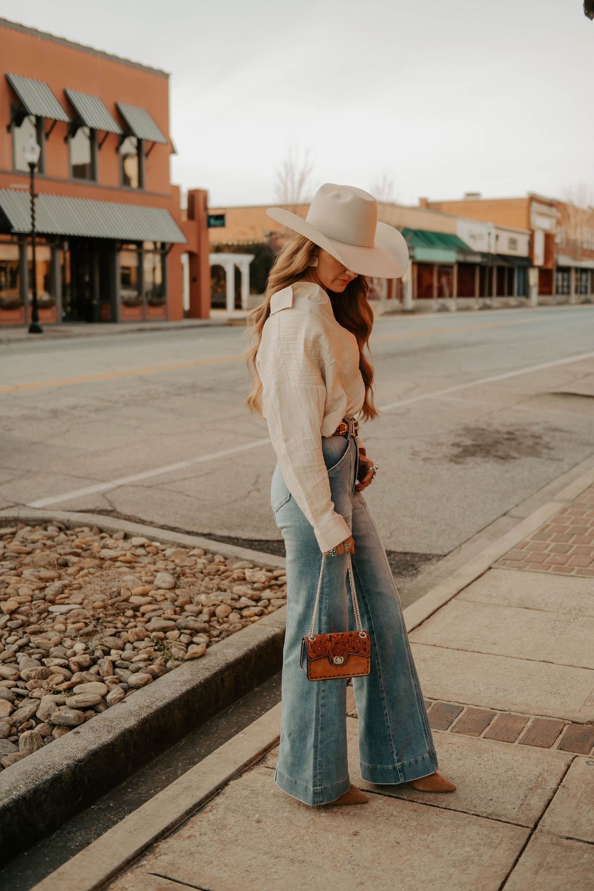 Ecru Tulsa Top by Western Vogue Boutique, casual long-sleeve blouse with a relaxed fit and subtle details.