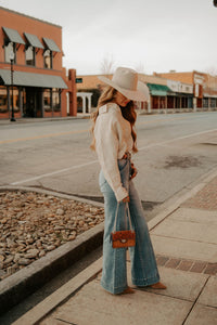 Ecru Tulsa Top by Western Vogue Boutique, casual long-sleeve blouse with a relaxed fit and subtle details.