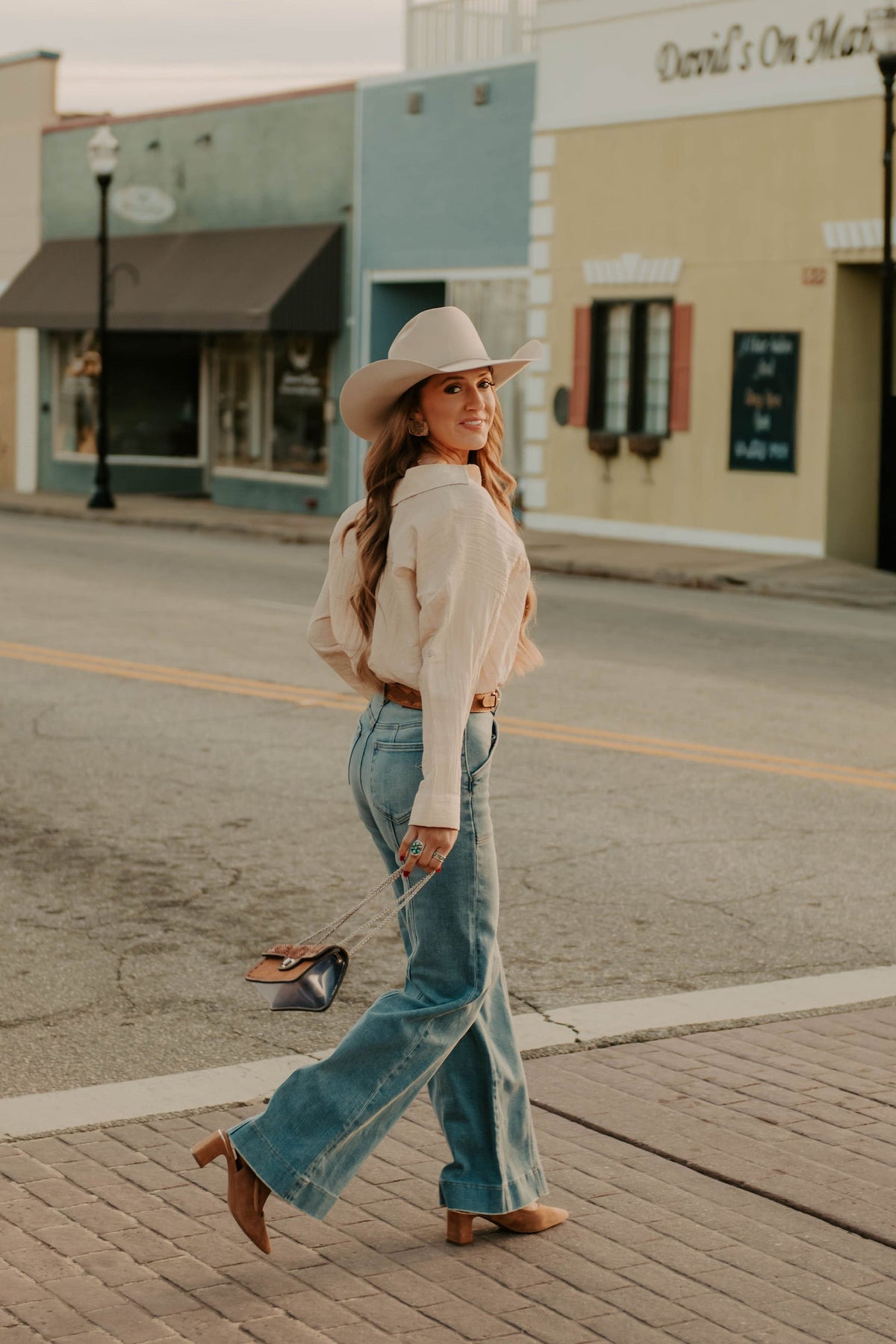 Ecru Tulsa Top by Western Vogue Boutique featuring a casual, stylish blouse with soft fabric and relaxed fit.