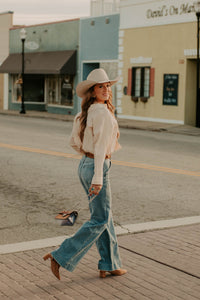 Ecru Tulsa Top by Western Vogue Boutique featuring a casual, stylish blouse with soft fabric and relaxed fit.