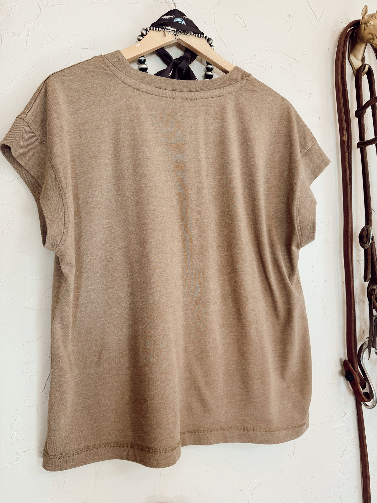 Western Vogue Boutique Western Icons T-Shirt, casual top with western-inspired graphic design, displayed on a white background.