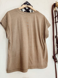 Western Vogue Boutique Western Icons T-Shirt, casual top with western-inspired graphic design, displayed on a white background.