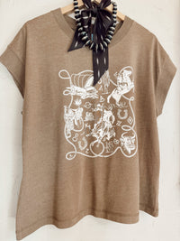 Western Vogue Boutique Western Icons T-Shirt, casual top with Western-inspired graphic design, short sleeves and comfortable fit.