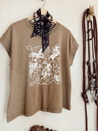 Western Vogue Boutique Western Icons T-Shirt, casual top featuring Western-inspired design and logo on soft fabric.