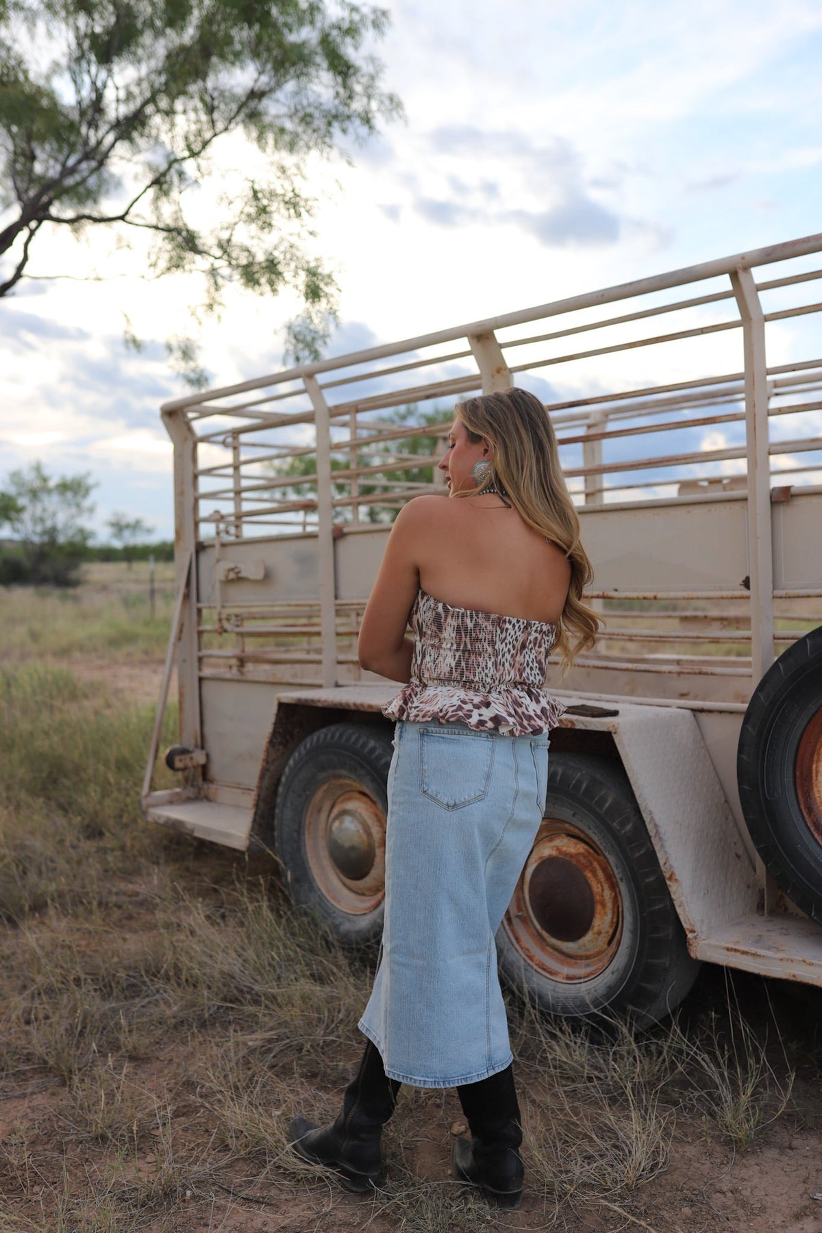 Wild Jackson Hole women's top by Western Vogue Boutique, featuring stylish design and comfortable fit, shown in the image.