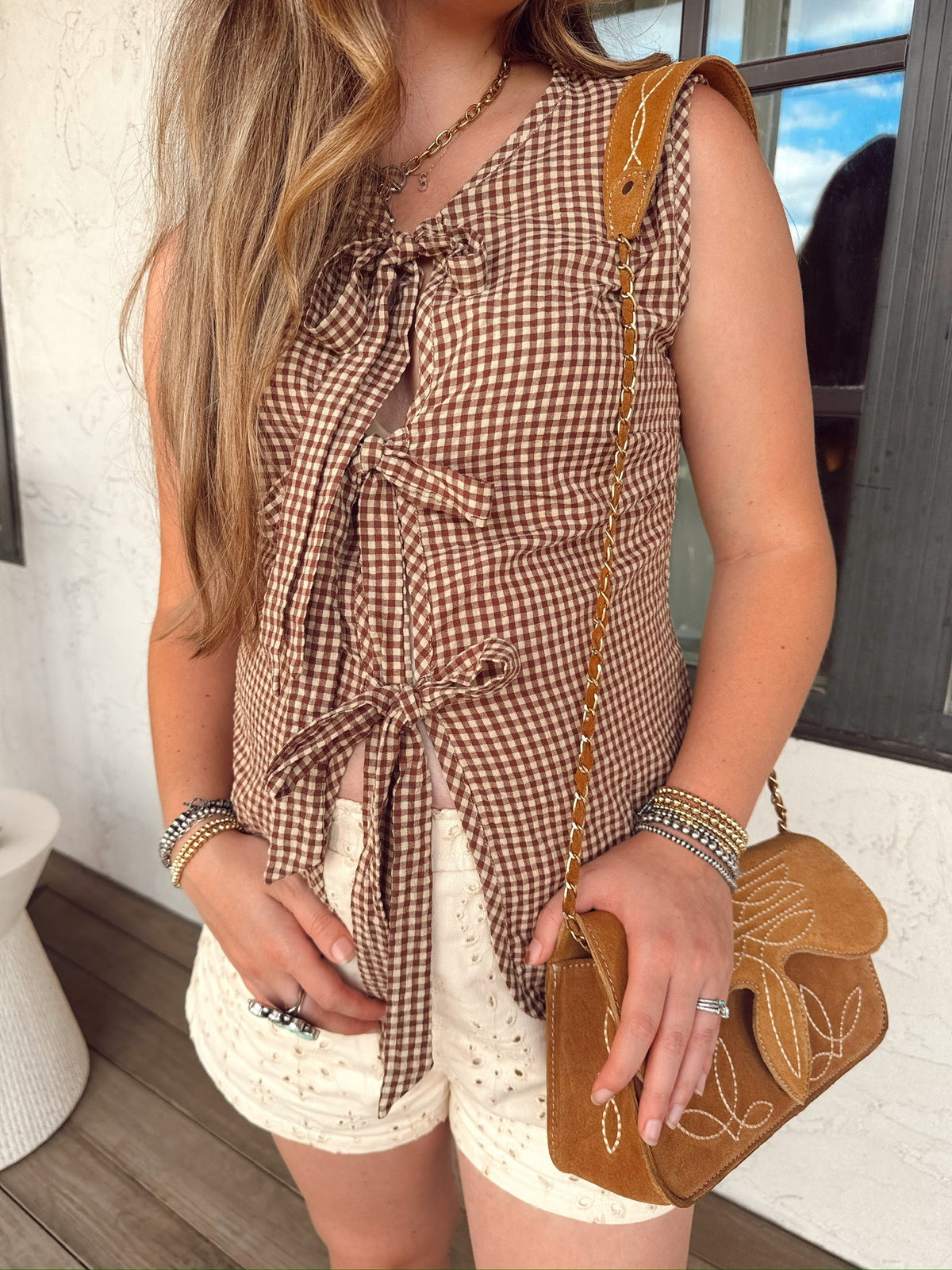 Western Vogue Boutique Wild West Girl vest, stylish western-inspired top with fringe details and rustic design, perfect for casual wear