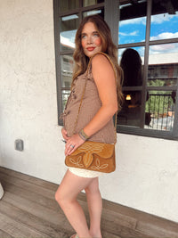 Western Vogue Boutique Wild West Girl vest, stylish western-themed sleeveless top with embroidery and fringe details.