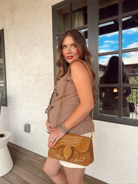 Western Vogue Boutique Wild West Girl vest, stylish Western-themed top with fringe and embroidery details, perfect for boho fashion.