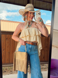White Bryn Luxe Cascade Halter top by Western Vogue Boutique, featuring a flowing design and halter neckline.
