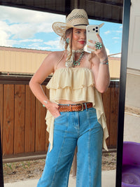 White Bryn Luxe Cascade Halter top by Western Vogue Boutique, featuring a flowing cascade design and halter neckline.