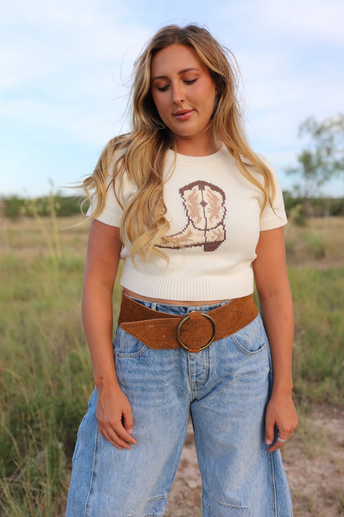 Women's cowgirl boot top from Western Vogue Boutique, featuring western-inspired design and stylish details.