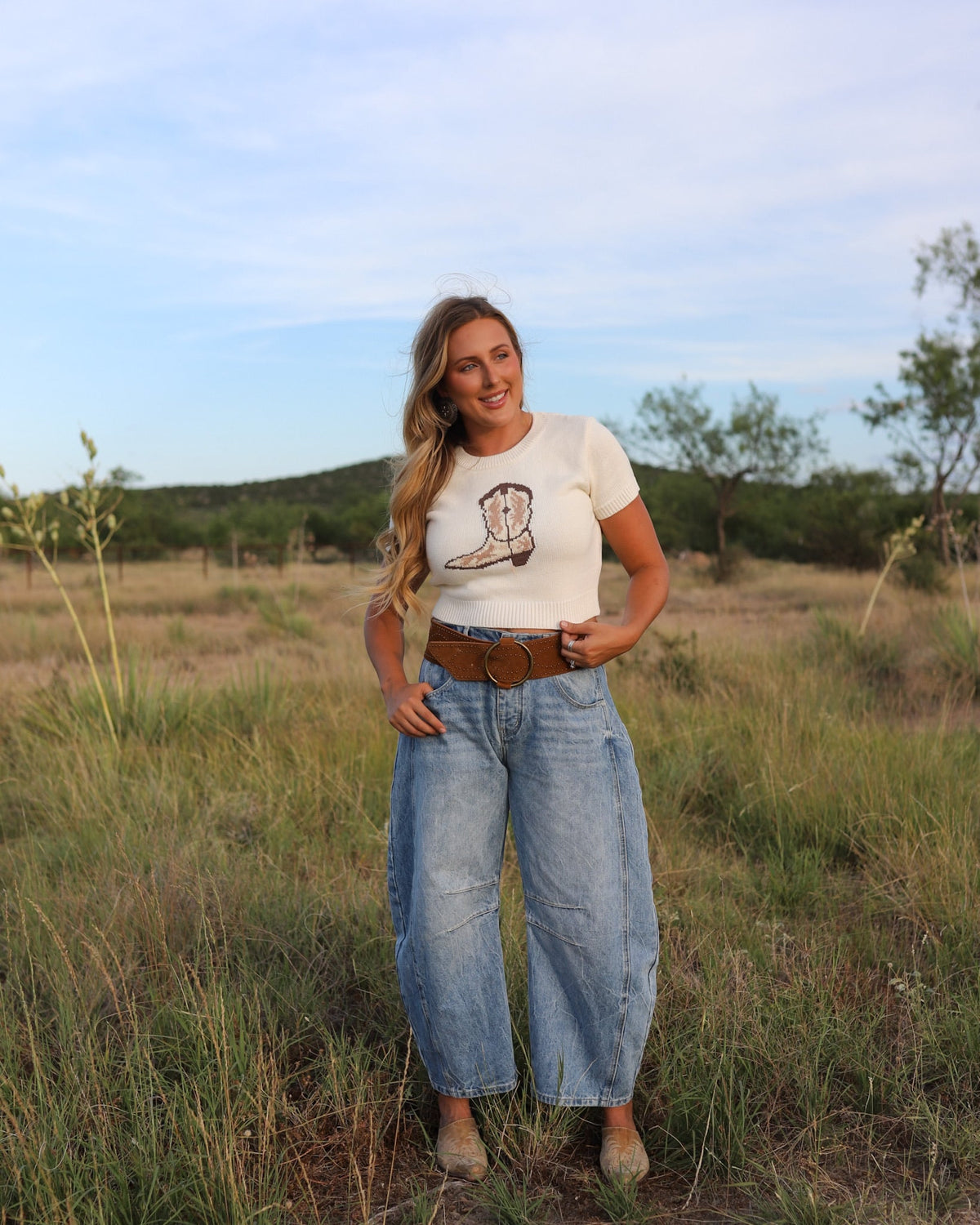 Women's cowgirl boot top from Western Vogue Boutique, featuring western-inspired design and stylish details.