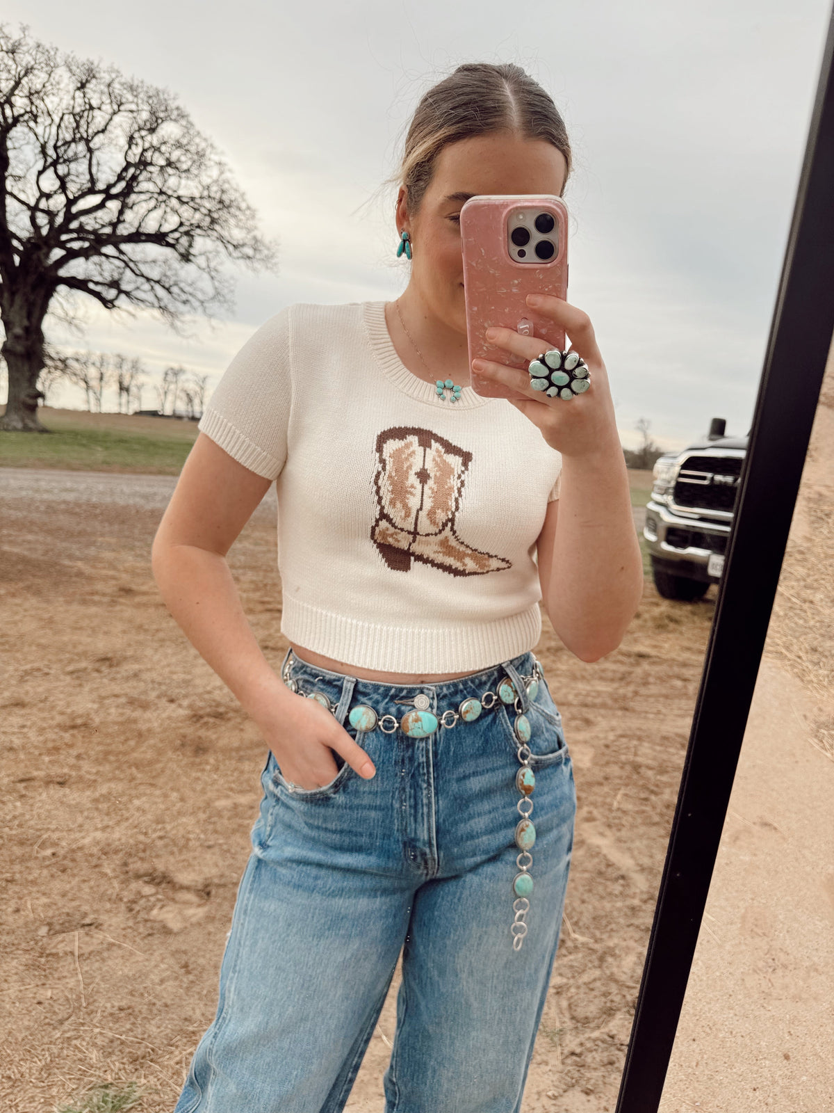 Women's cowgirl boot-themed top by Western Vogue Boutique, featuring western-inspired design and casual style.