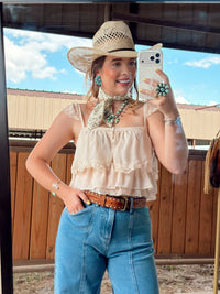 Lady Hunter Ruffle Top from Western Vogue Boutique, featuring feminine ruffle details and stylish design in a close-up view.