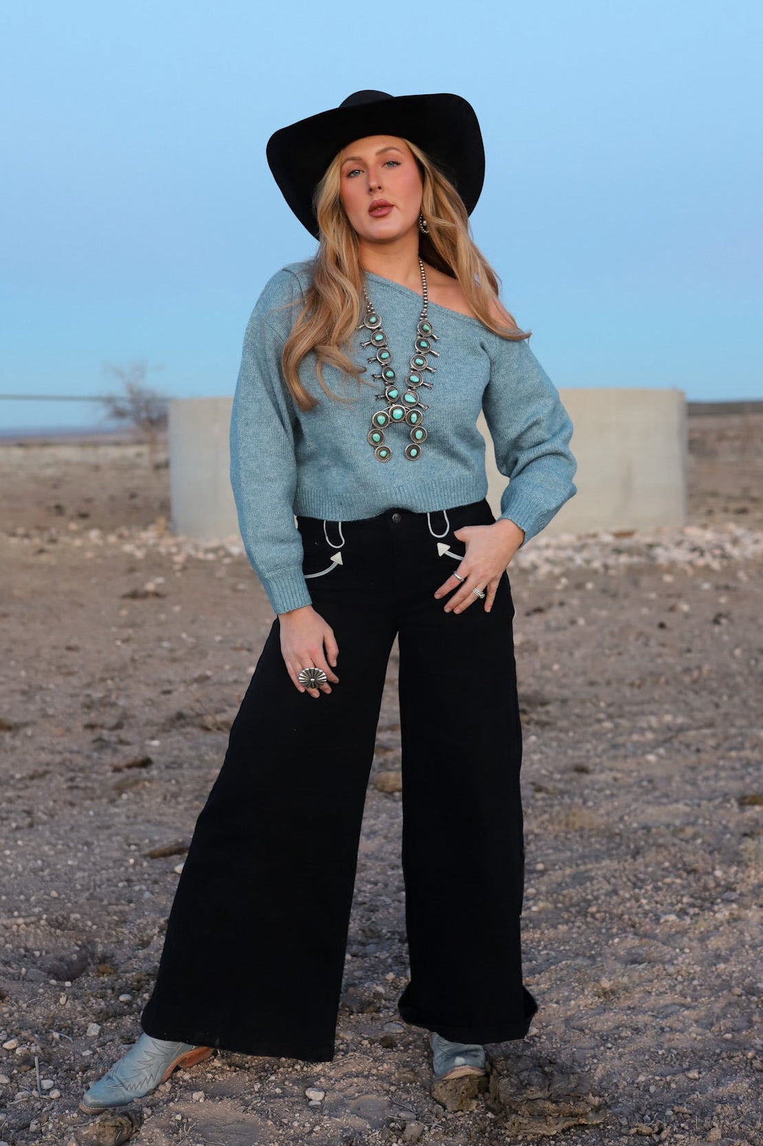 Light gray The Bellamy women's sweater from Western Vogue Boutique, featuring a cozy knit top with a relaxed fit.
