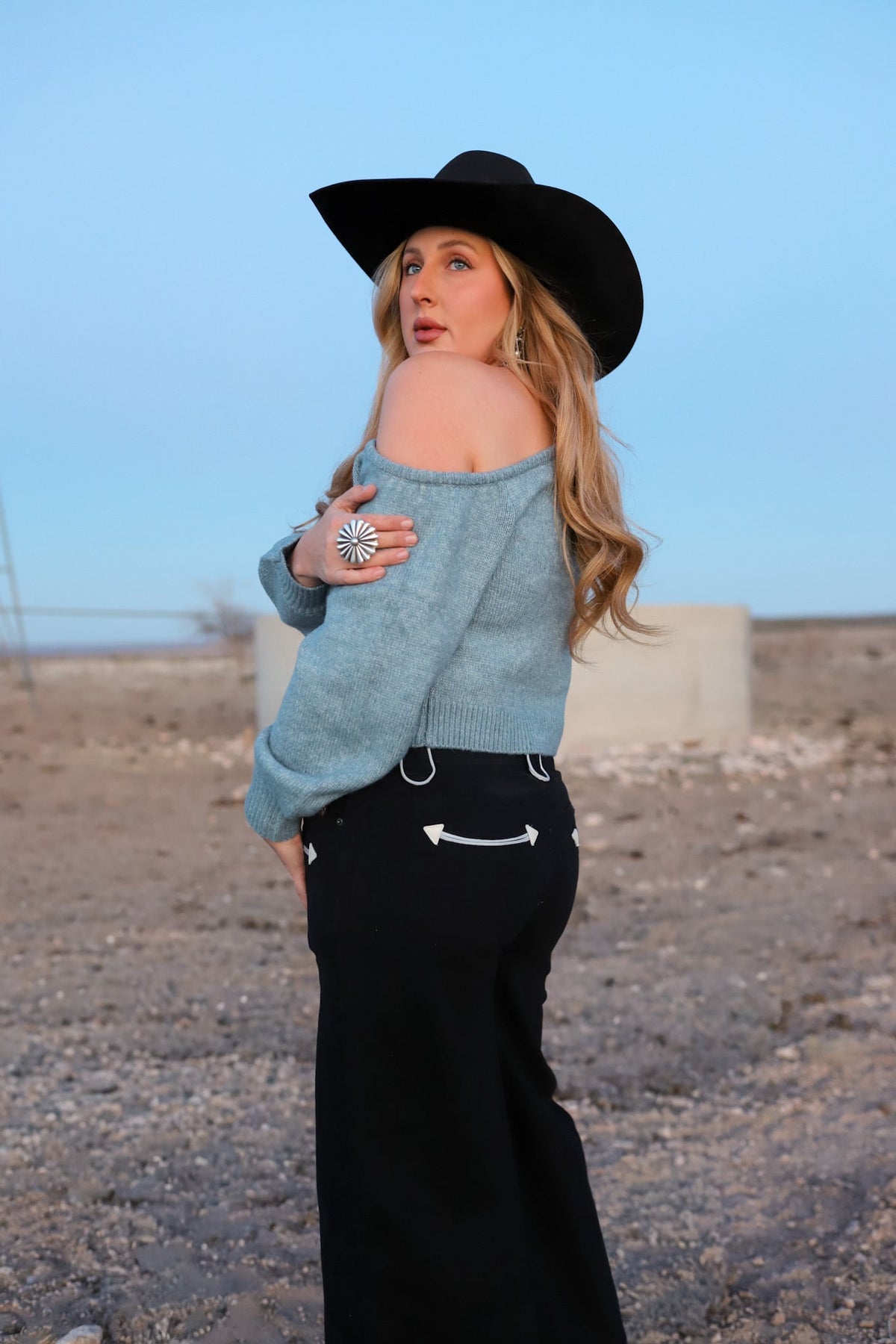 Light blue The Bellamy women's sweater from Western Vogue Boutique, featuring a cozy knit top with long sleeves.