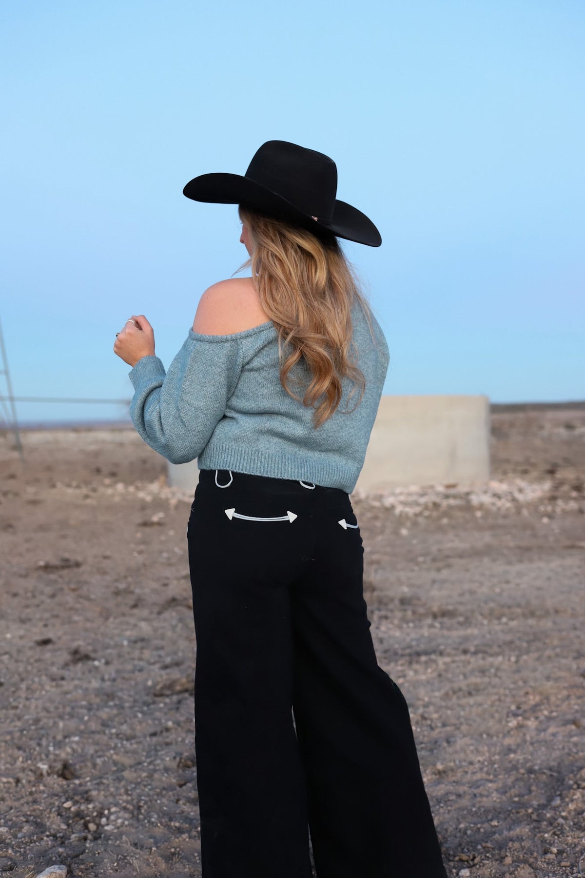 Light beige The Bellamy women's sweater from Western Vogue Boutique, featuring a cozy knit design and long sleeves.