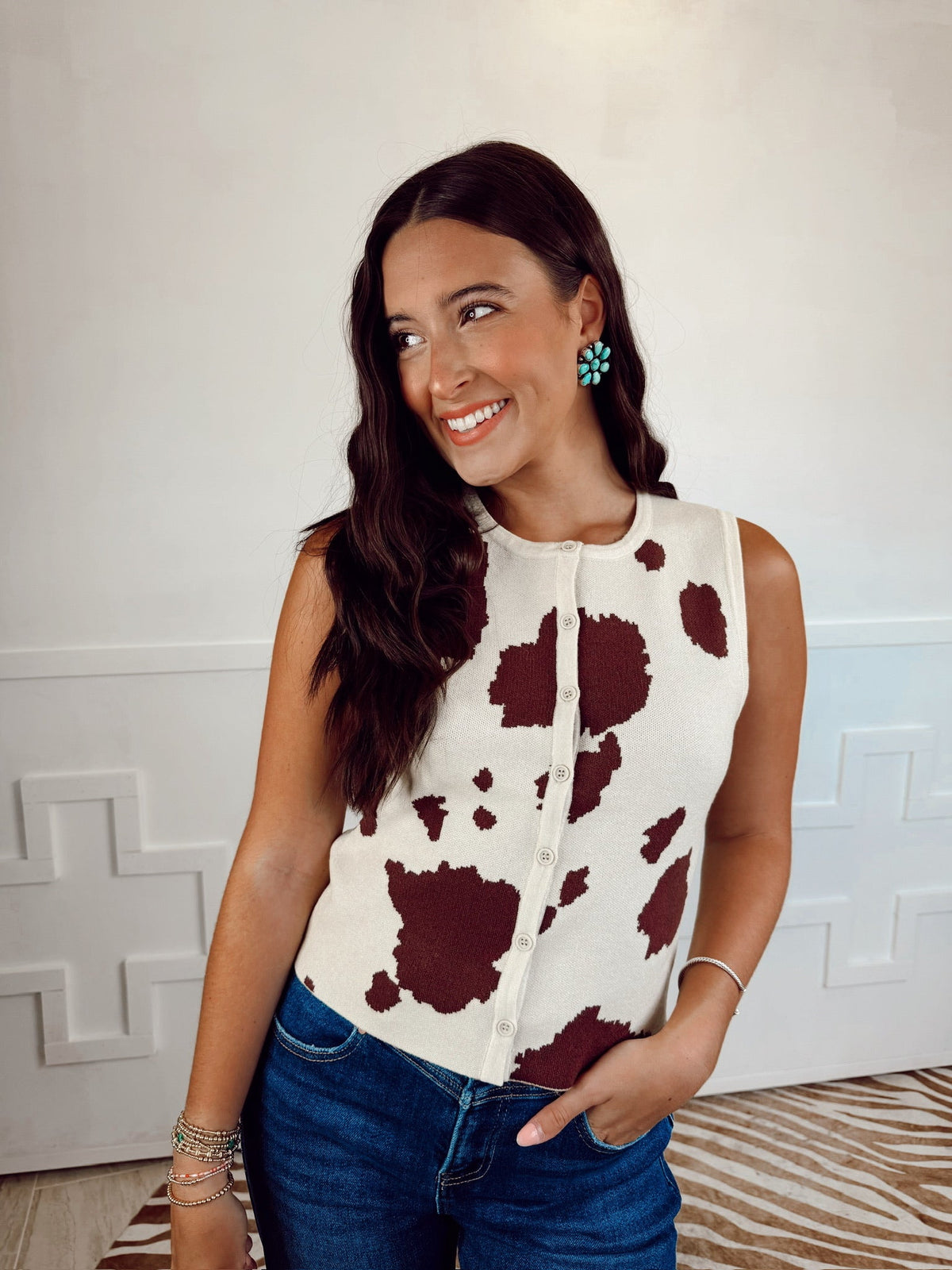 Western Vogue Boutique Braford Women's Top displayed on a hanger, featuring a casual design with a relaxed fit and soft fabric.