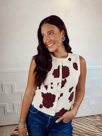 Western Vogue Boutique Braford Women's Top displayed on a hanger, featuring a casual design with a relaxed fit and soft fabric.