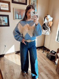 Light blue The Bristol Women's Sweater from Western Vogue Boutique, featuring a cozy knit design and a relaxed fit.