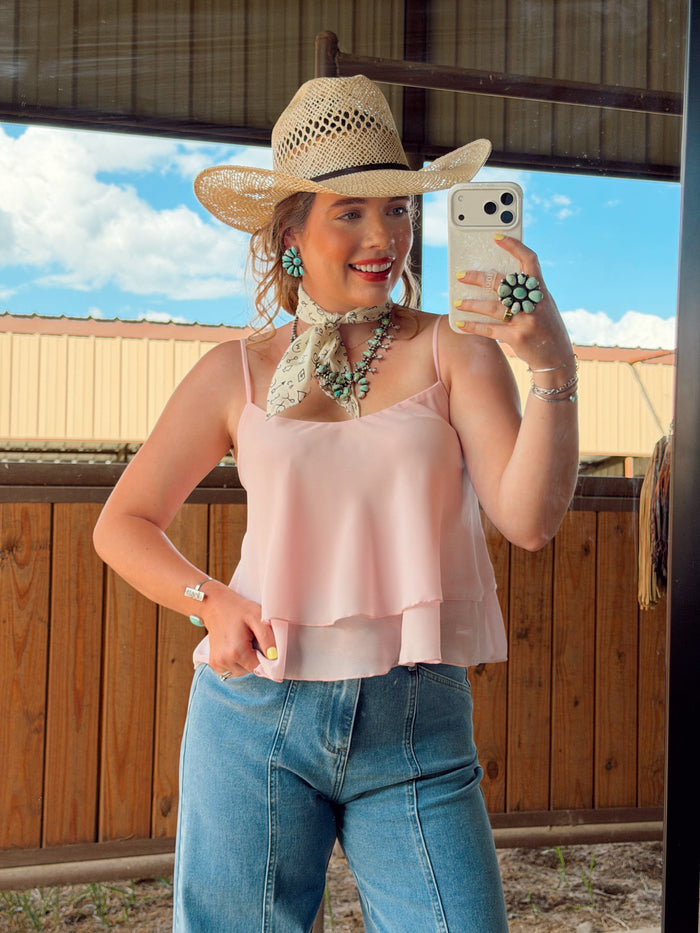 Pink top from Western Vogue Boutique's Potter collection, featuring a stylish, casual design with a comfortable fit.