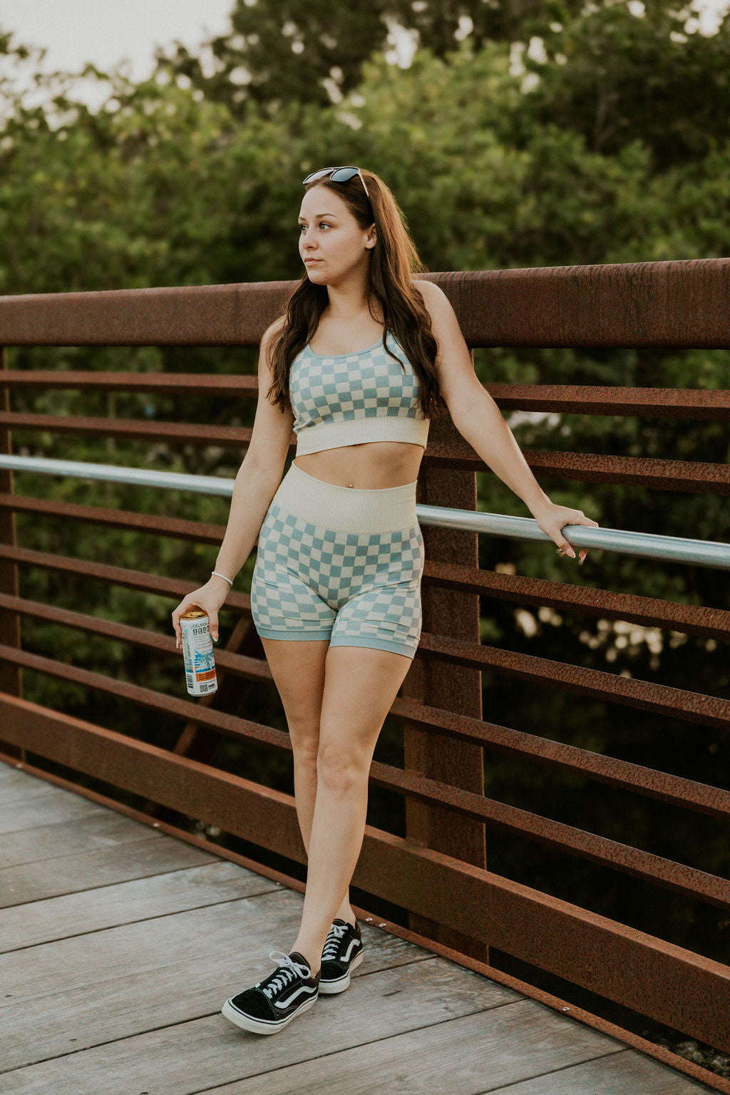 Checkered women's gym set by Wild Cactus Boutique featuring peachy beige and white activewear for workouts and fitness.