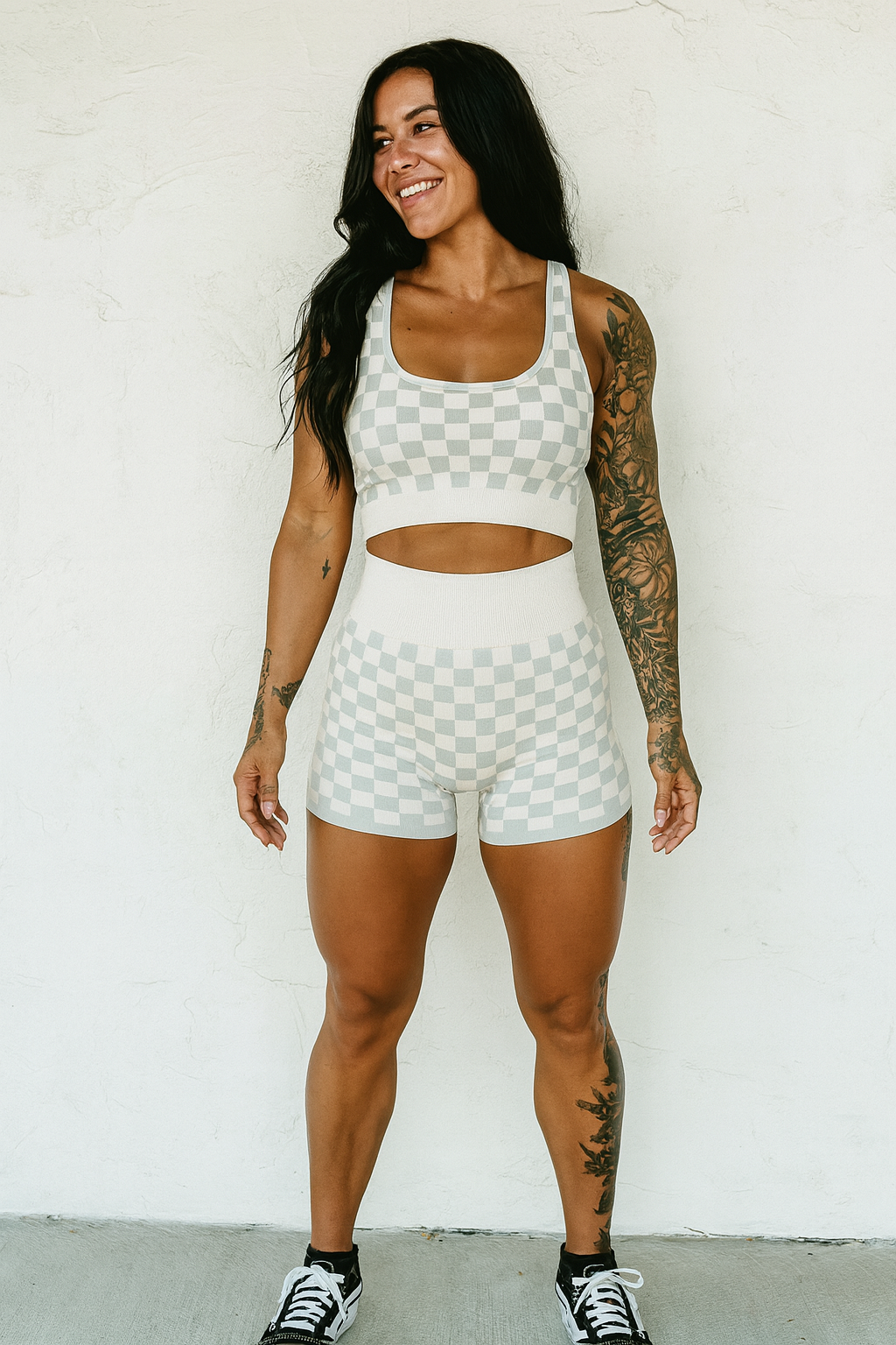 Peachy beige and white checkered women's gym set by Wild Cactus Boutique, activewear including sports bra and leggings.