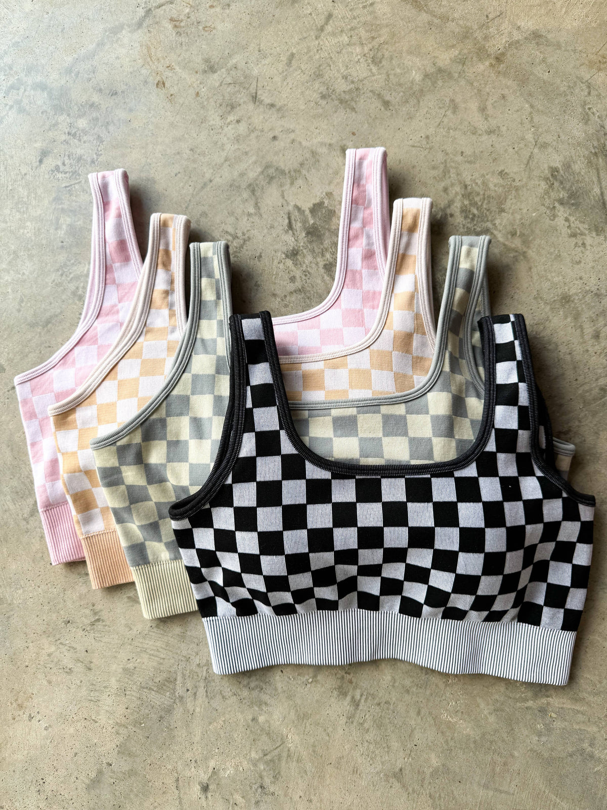 Peach and beige checkered women's gym set by Wild Cactus Boutique, activewear top and matching leggings for workout or activewear.