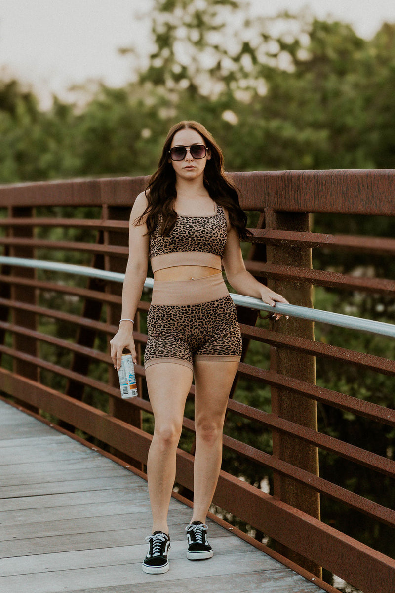 Leopard print women's gym set by Wild Cactus Boutique, activewear with matching sports bra and leggings, stylish workout outfit.